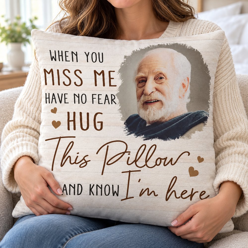 Woman hugging the personalized When You Miss Me custom photo pillow in a bright cozy armchair