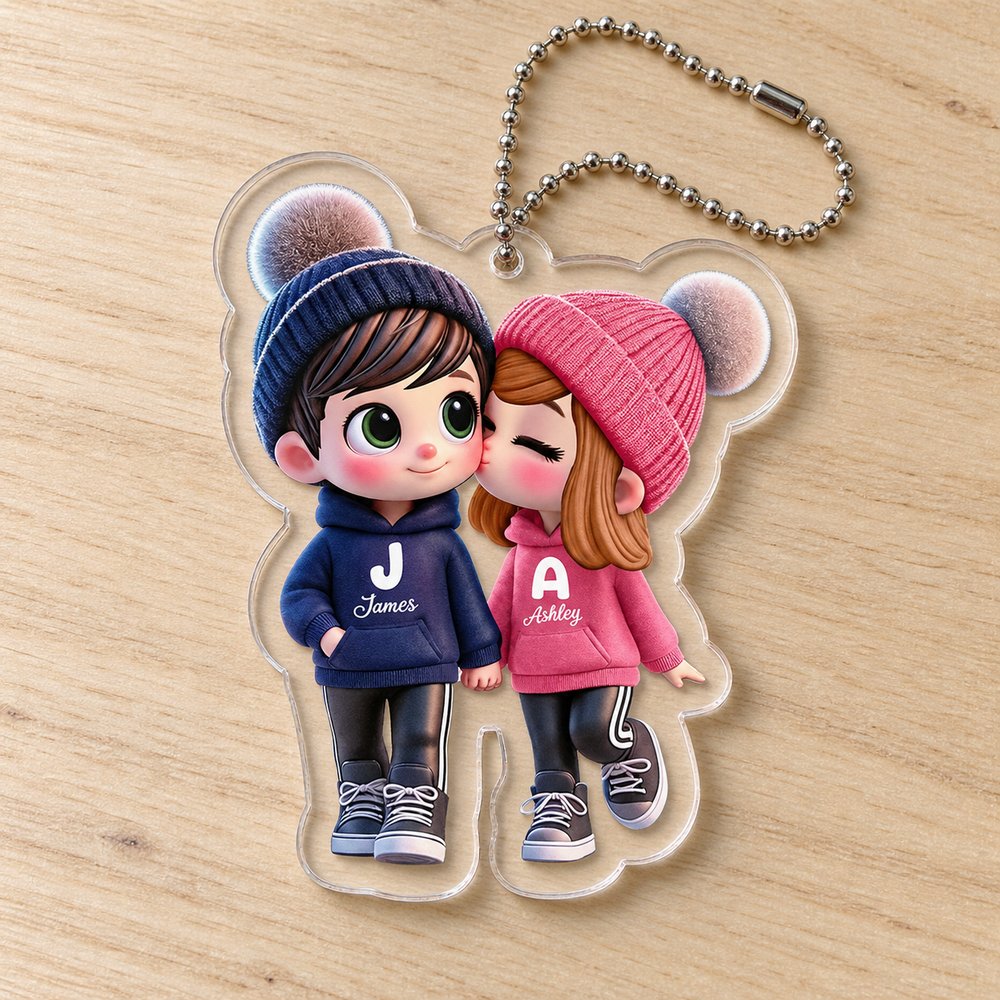 Close-up detail of personalized couple acrylic car hanger showing glossy print and cut acrylic edge