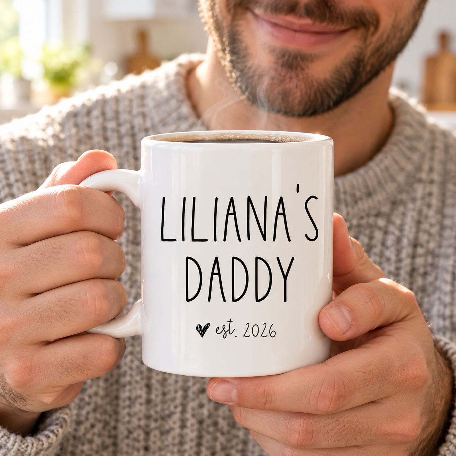 New dad holding personalized Lilianas Daddy est 2026 white ceramic coffee mug with steam