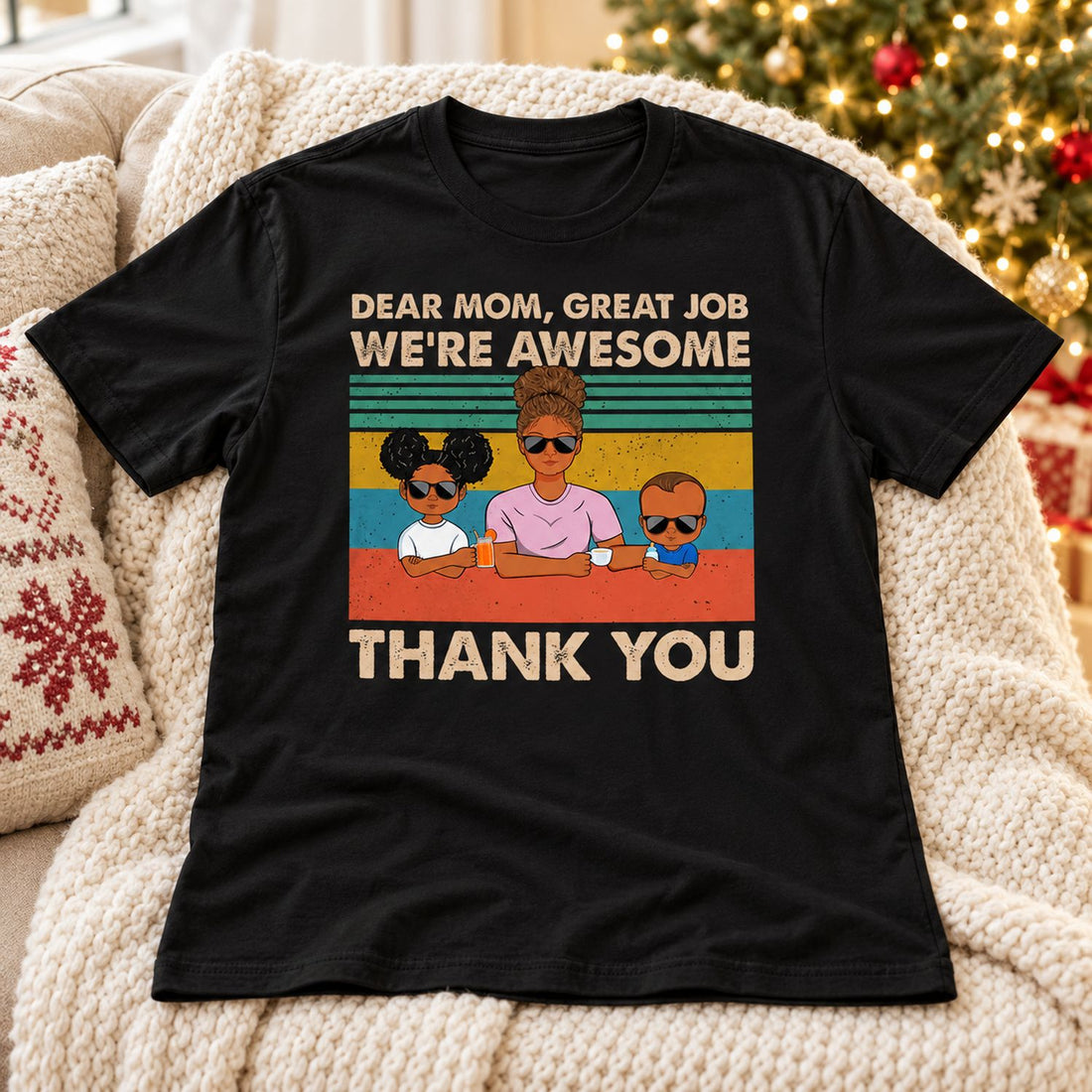 Dear Mom Great Job personalized t-shirt laid on a cozy sofa near a Christmas tree