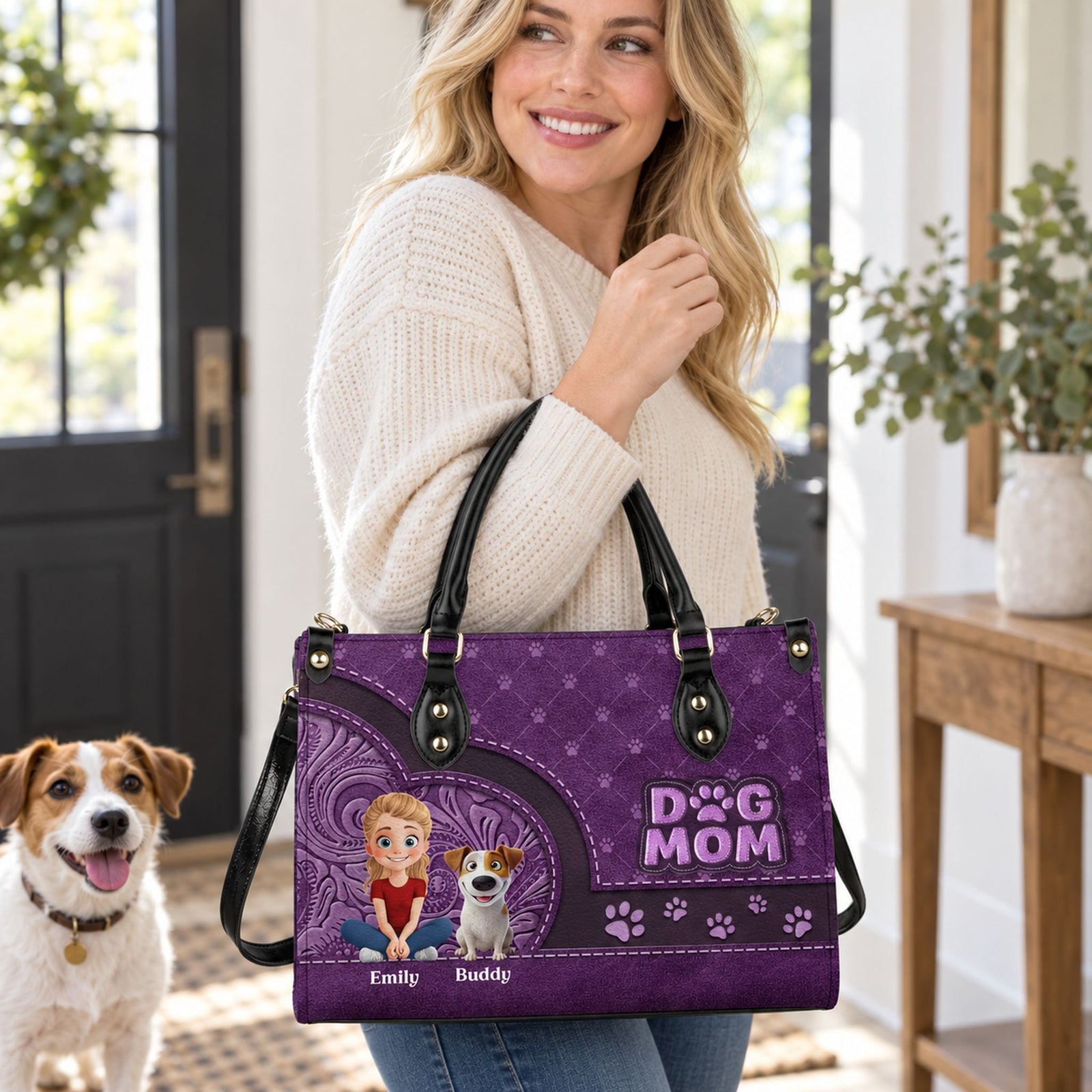 Woman carrying the purple Dog Mom personalized leather handbag by its black handles