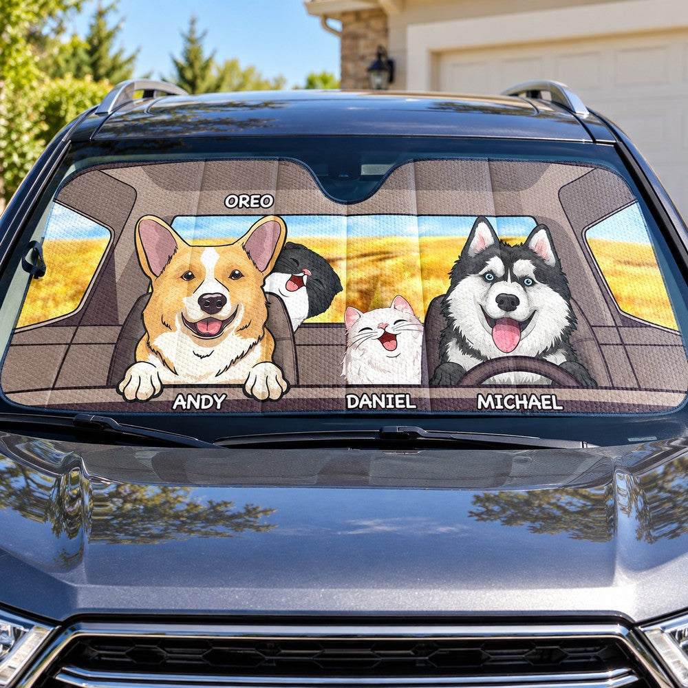 Personalized dogs and cats car windshield sunshade installed in SUV front window on a sunny day