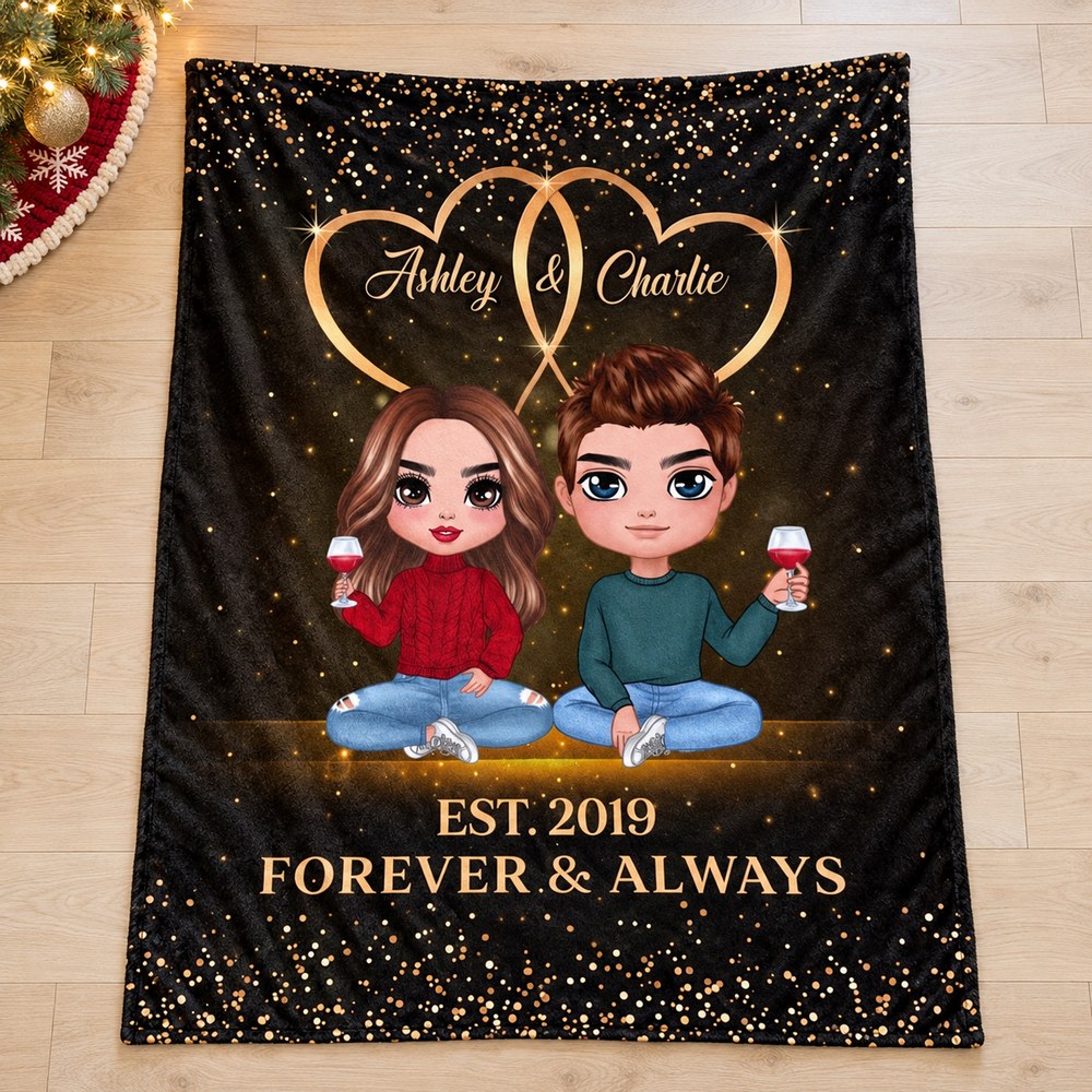 Custom couple anniversary blanket laid flat on floor near holiday tree lights