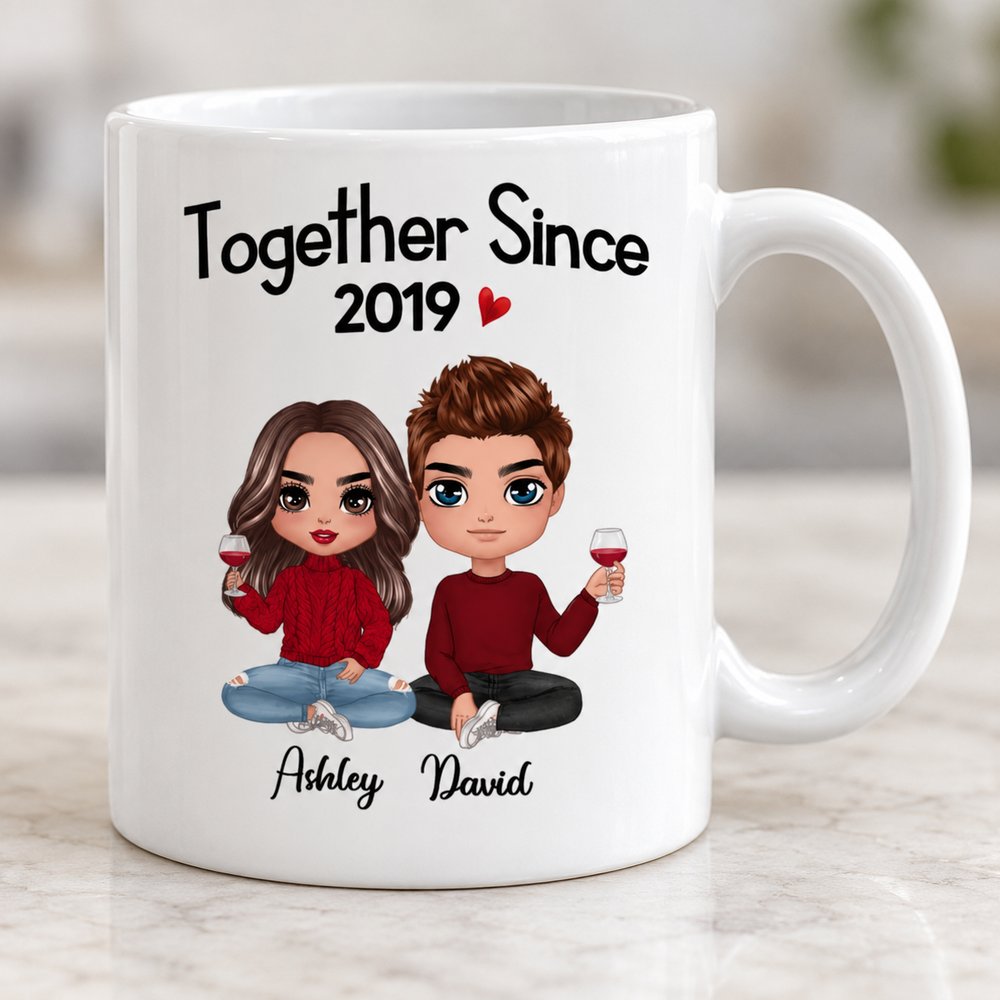 Close up detail of glossy ceramic mug print showing personalized doll couple design