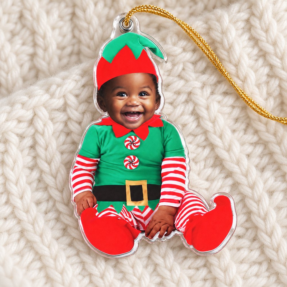Close-up detail of custom-shaped acrylic baby elf ornament print and glossy edge