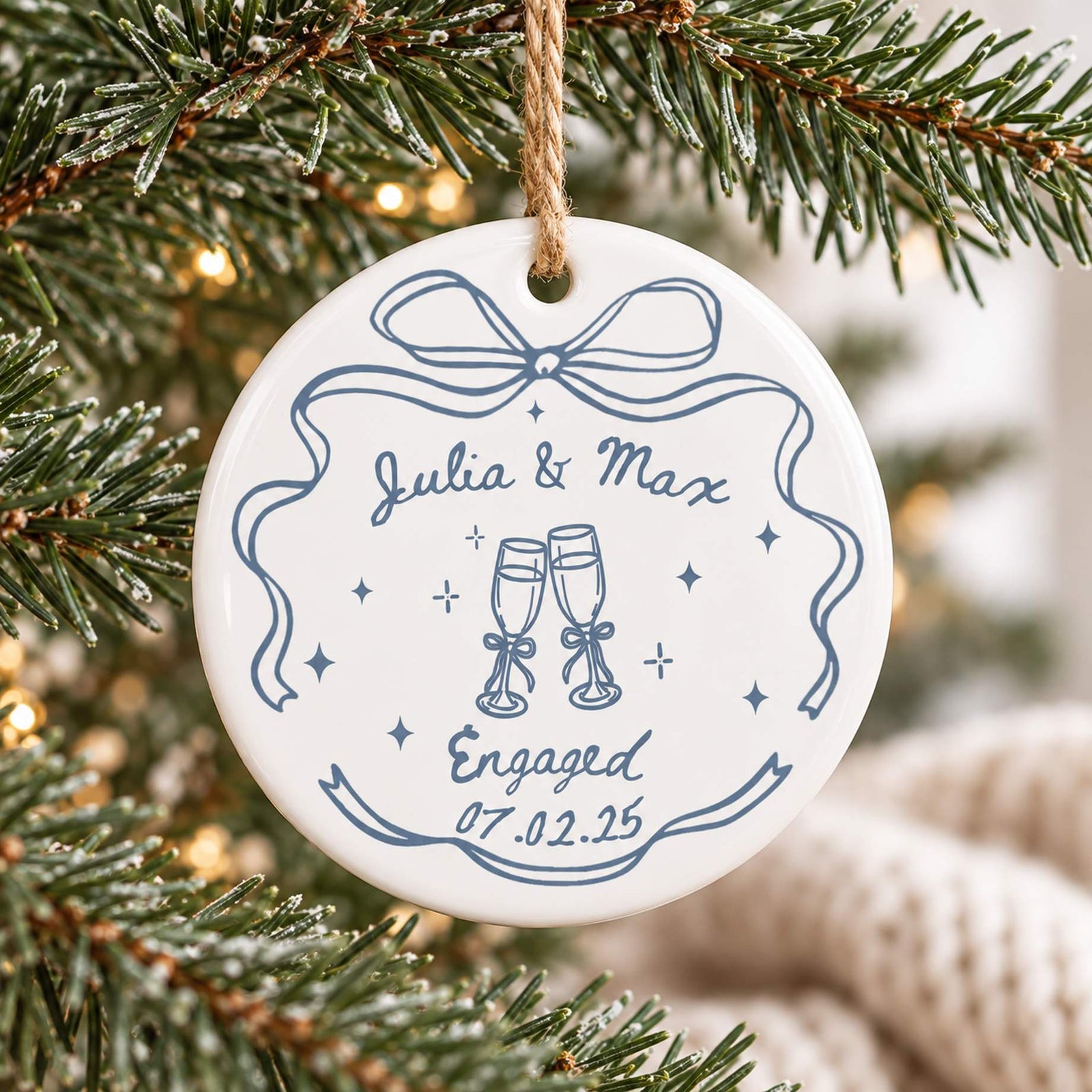Macro closeup of glossy ceramic engagement ornament print and champagne glasses detail
