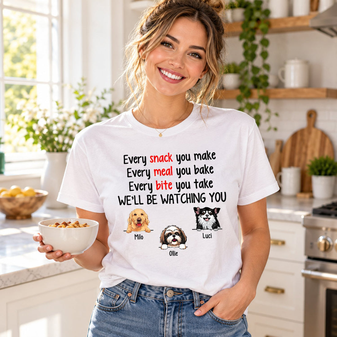 Woman wearing Every Snack You Make personalized funny dog t-shirt in a bright kitchen