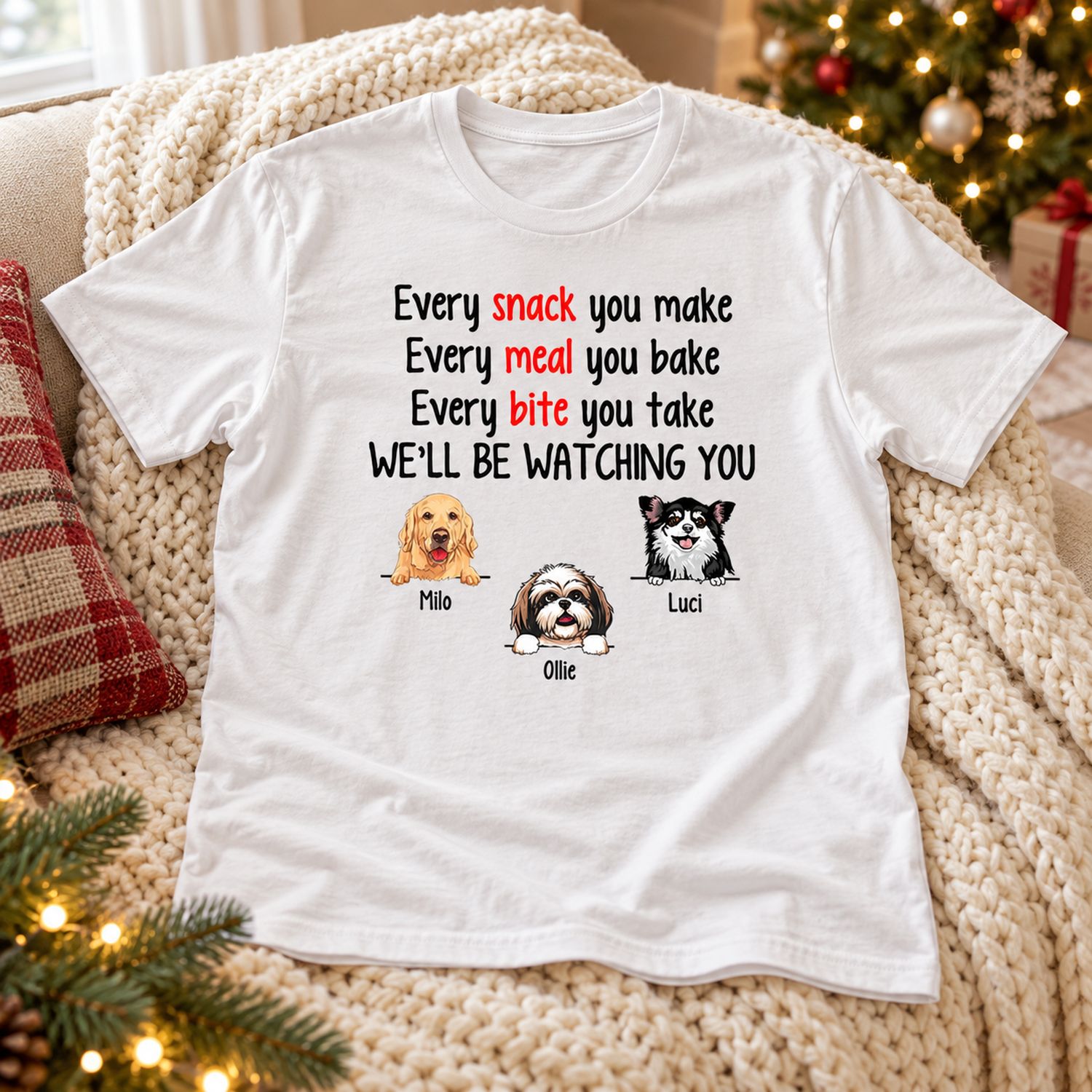 Personalized funny dogs custom t-shirt laid on a cozy sofa near a Christmas tree