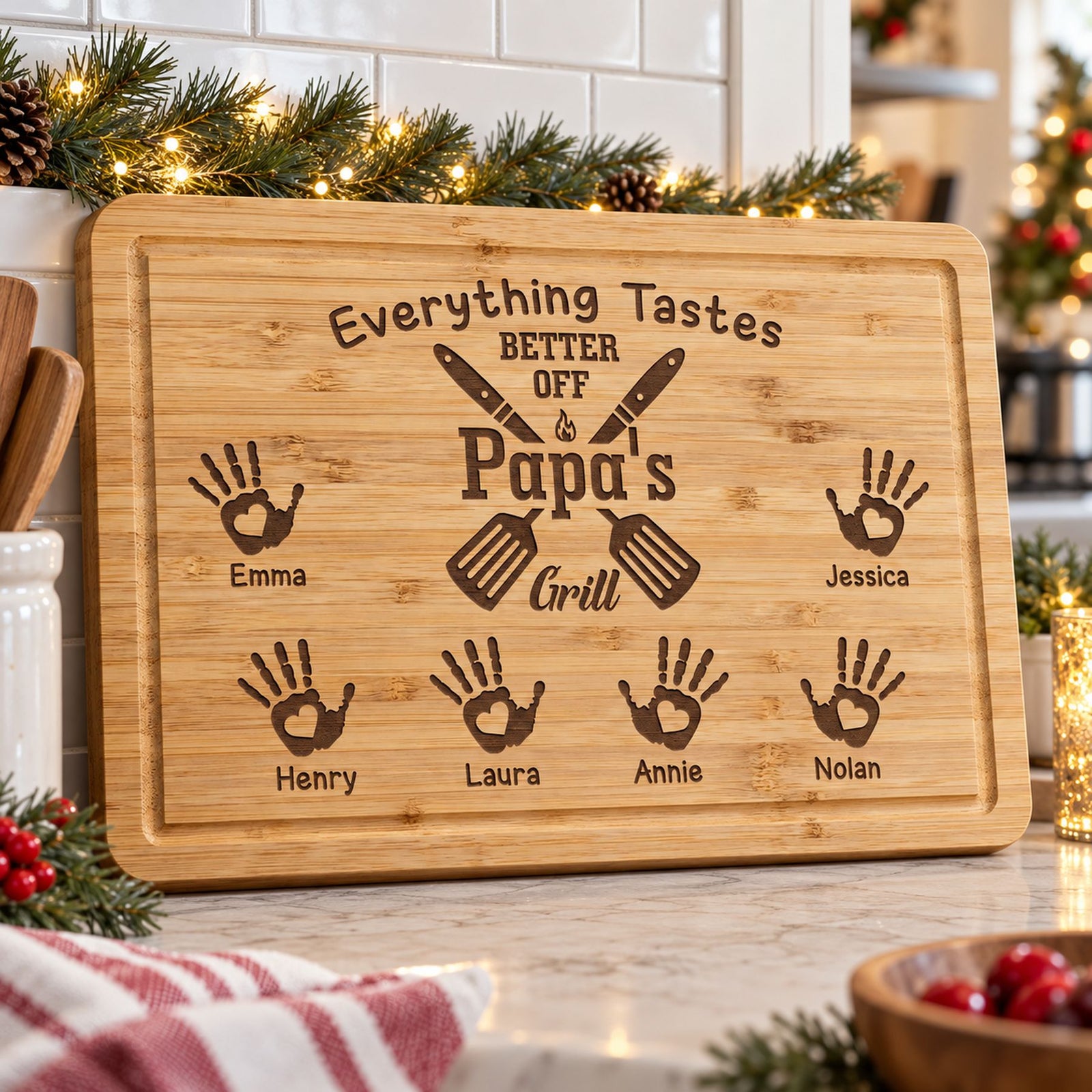 Personalized Papa's Grill engraved wooden cutting board displayed in a festive holiday kitchen