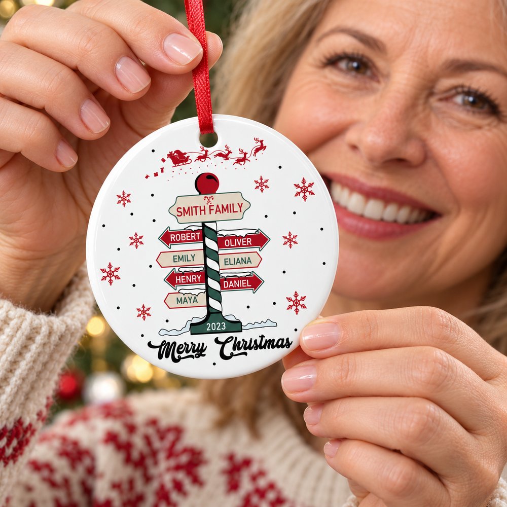 Close-up detail of glossy ceramic texture and vibrant print on family Christmas ornament