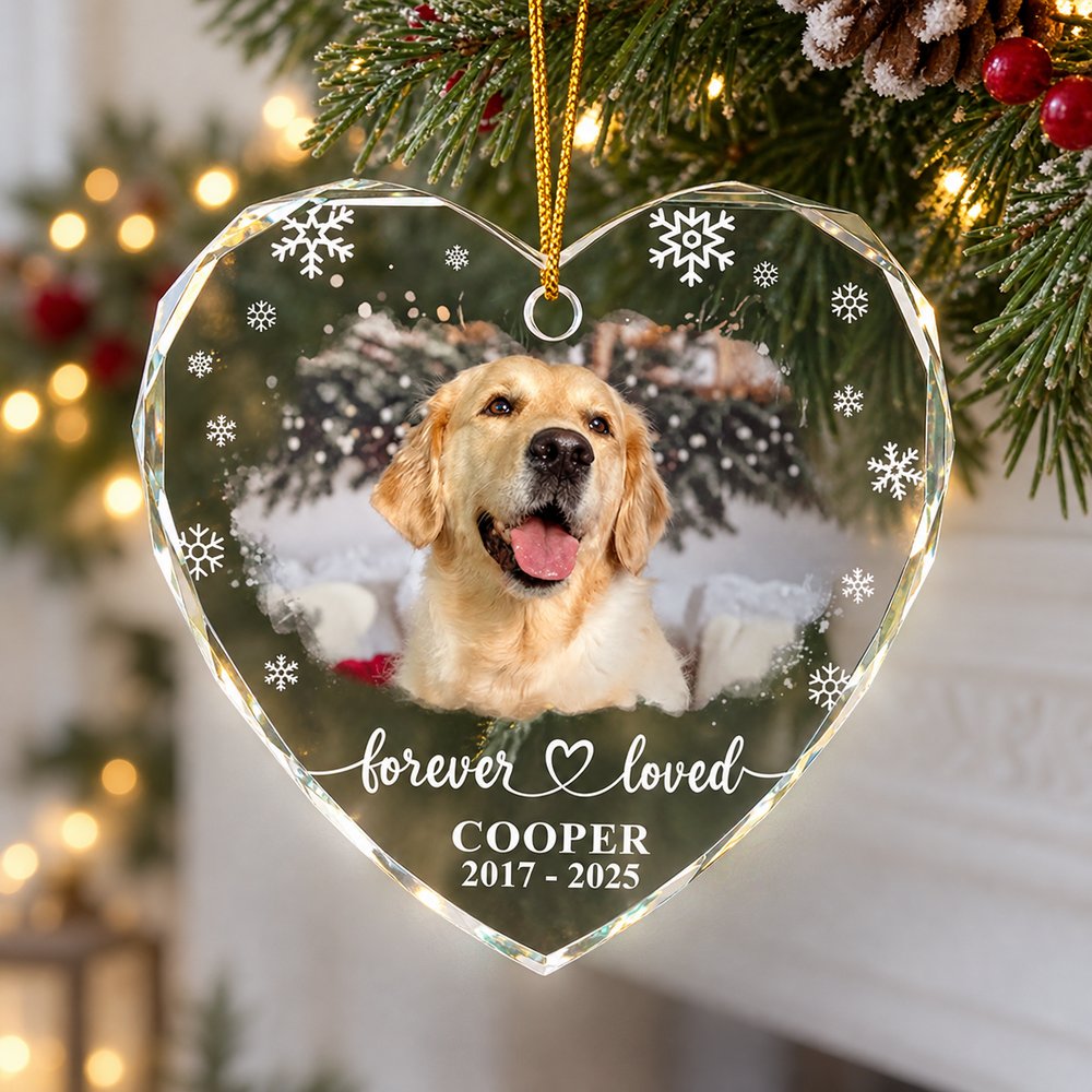 Personalized heart glass pet memorial ornament hanging on a Christmas mantel garland