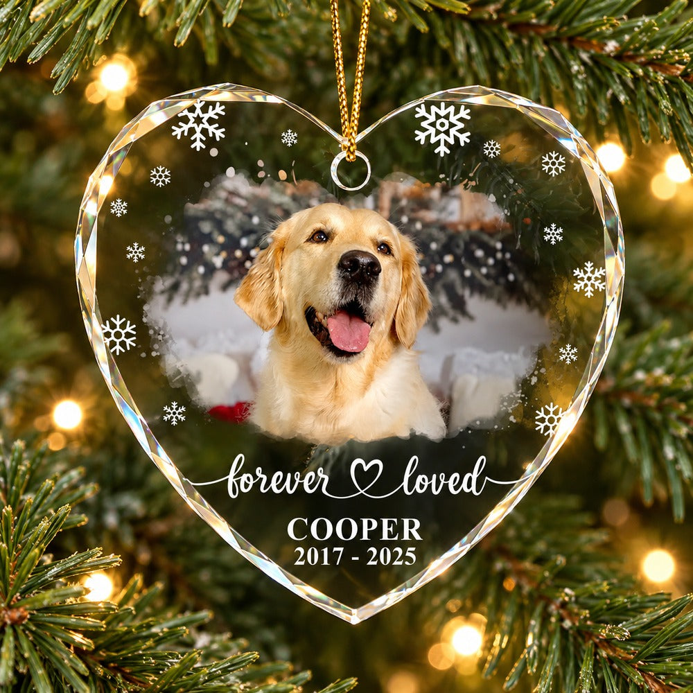 Custom photo Forever Loved memorial dog heart glass ornament hanging on a Christmas tree branch