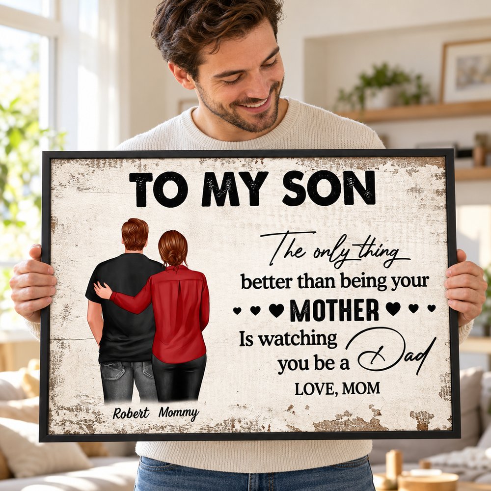 Adult son holding his personalized To My Son Watching You Be A Dad framed wall art gift from mom