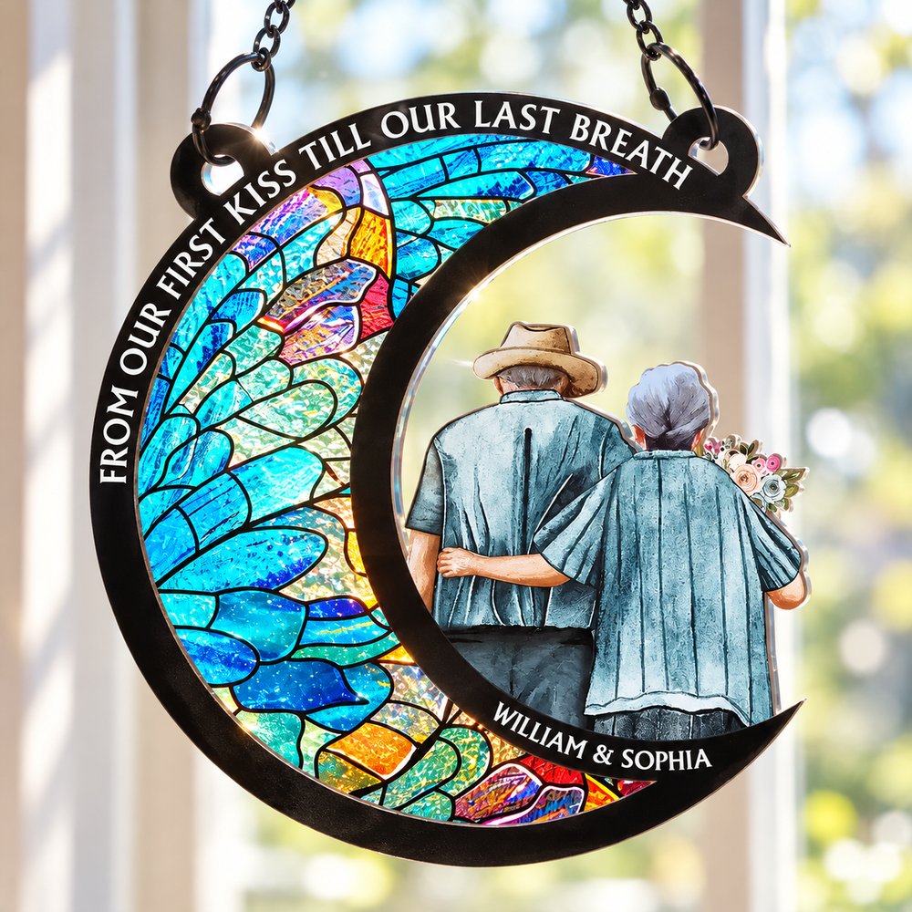 Close-up detail of stained glass acrylic texture and layered frame on couple suncatcher ornament