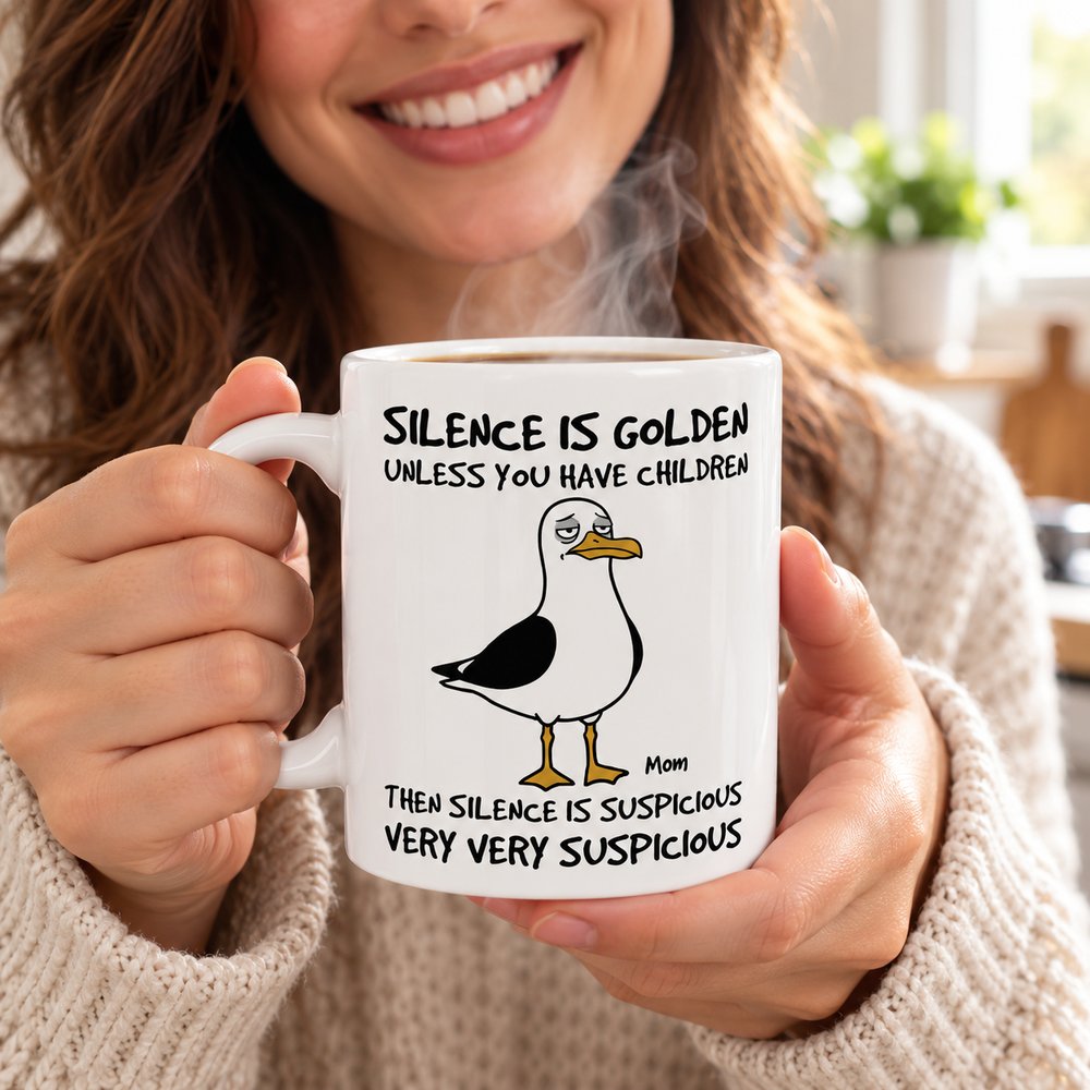 Mom holding funny seagull Silence Is Golden personalized ceramic mug in bright kitchen