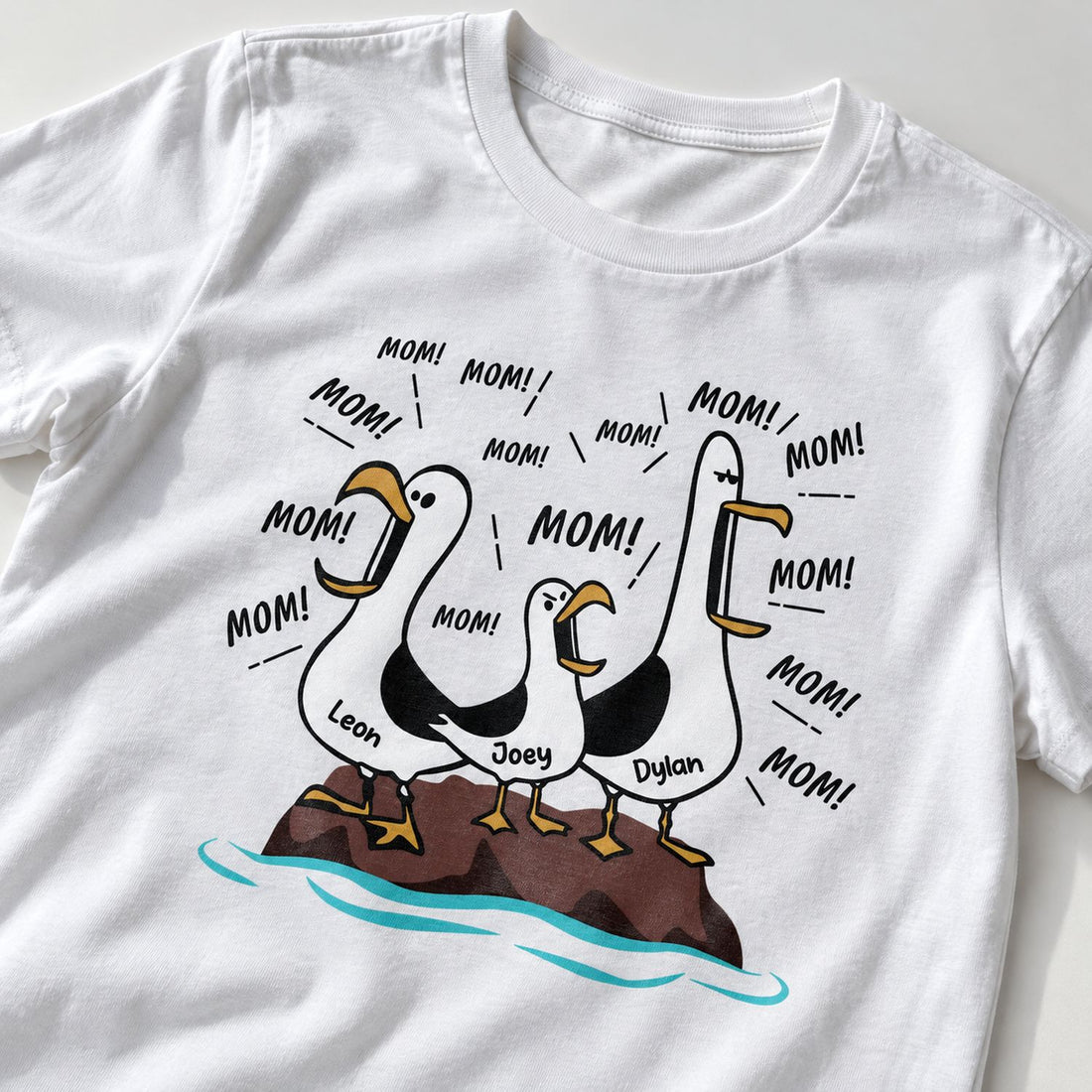 Close-up detail of funny seagull Mom personalized print and cotton fabric texture