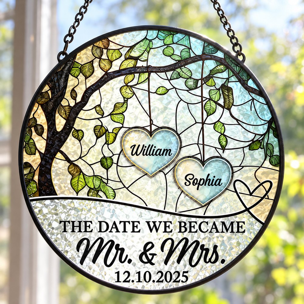 Close-up detail of textured stained glass suncatcher print and black metal frame