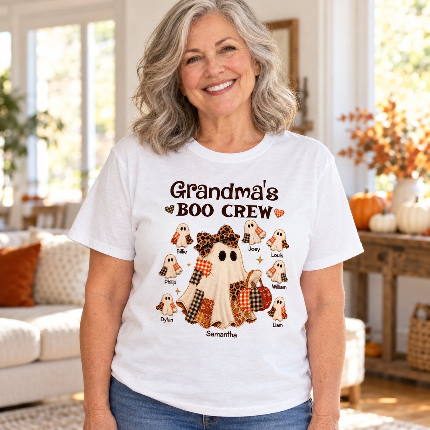 Grandma wearing personalized Grandma Boo Crew patchwork ghost Halloween t-shirt at home