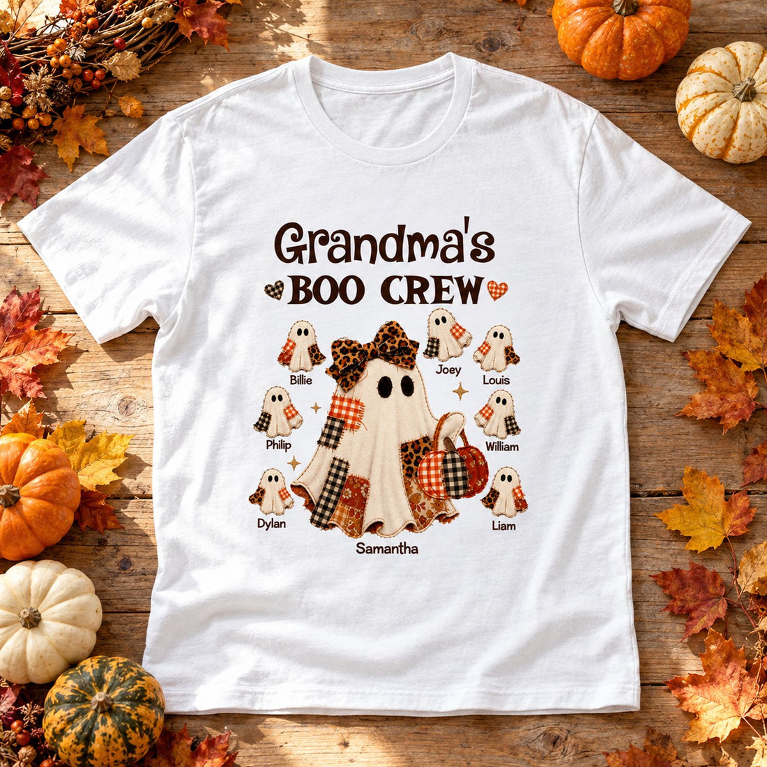Personalized Grandma Boo Crew Halloween t-shirt flat lay with autumn pumpkins and leaves