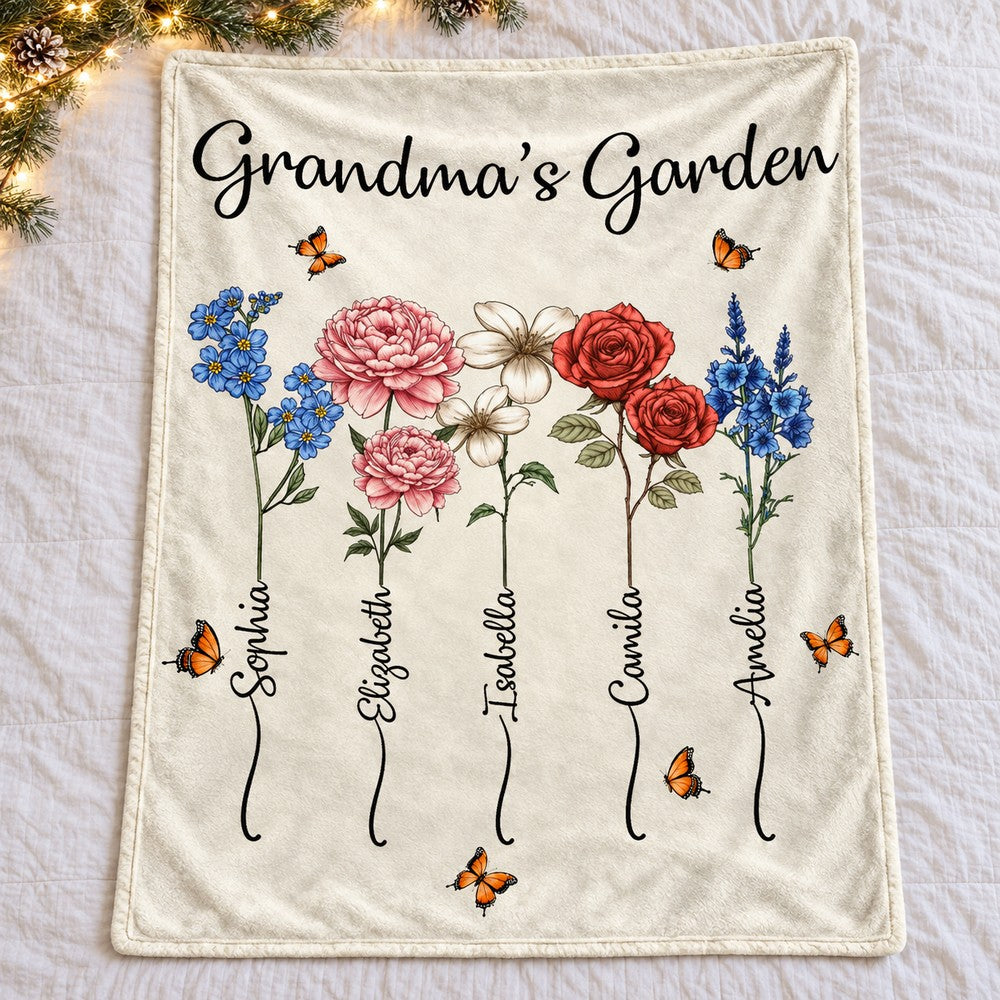 Grandmas Garden birth flower personalized blanket spread flat on bed with holiday greenery