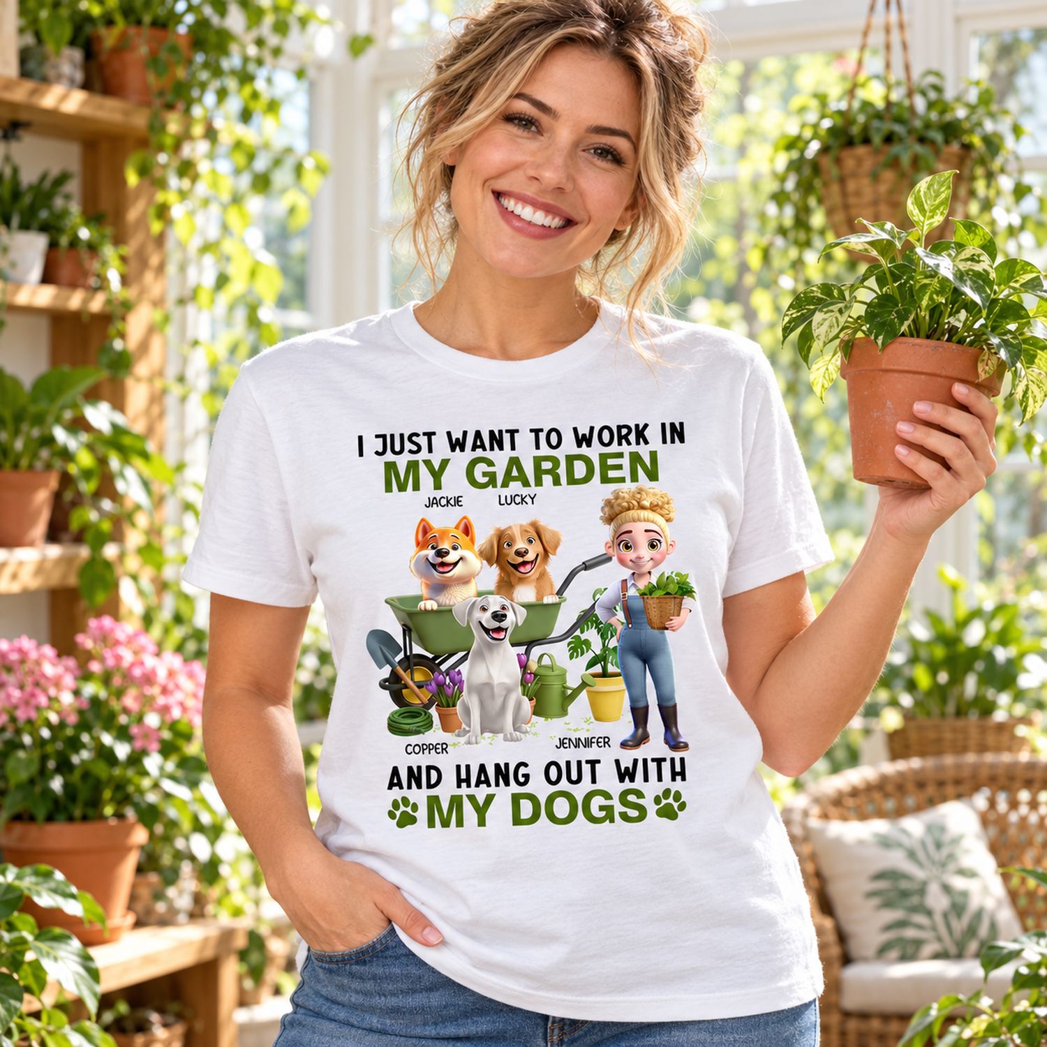 Woman wearing personalized work in my garden and hang out with my dogs white t-shirt in a bright plant-filled sunroom