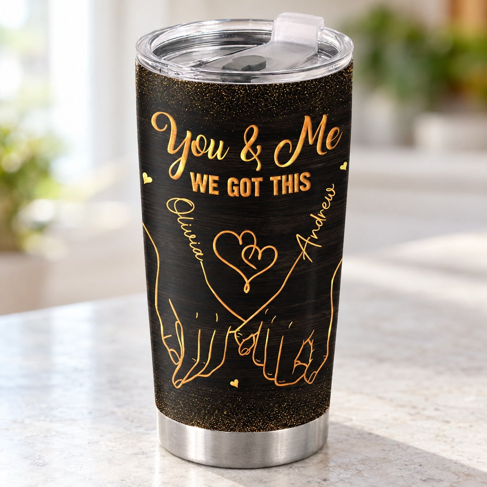 Close-up detail of personalized names Olivia and Andrew and gold hands on 20oz tumbler