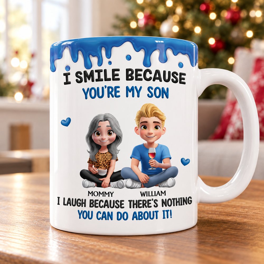 Personalized son mug from mom on wooden table near Christmas tree