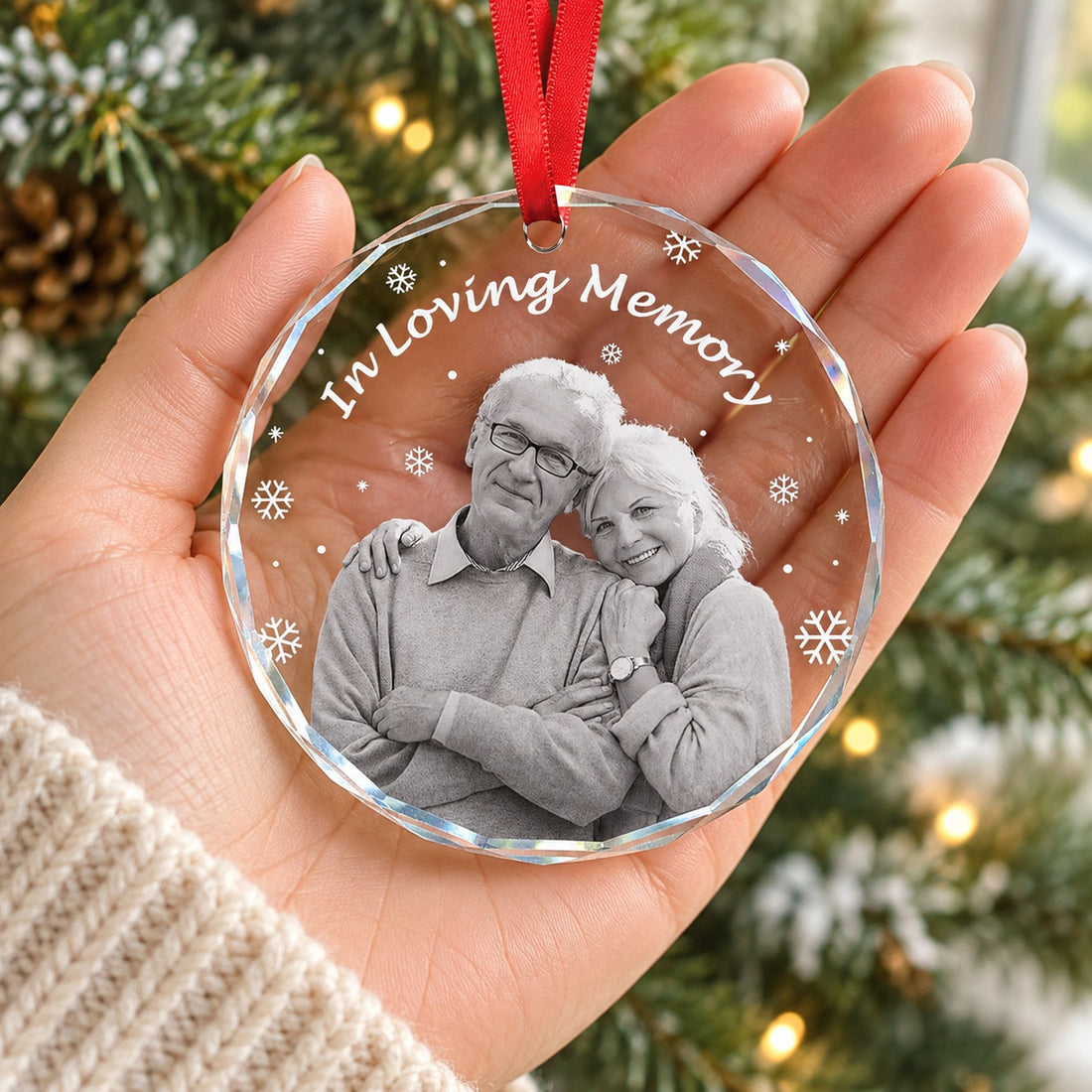 Custom photo memorial circle glass ornament held in a hand to show real size