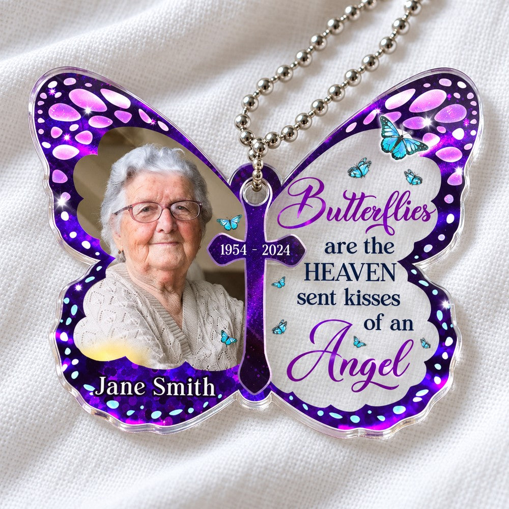 Macro closeup of clear acrylic edge and UV print on personalized butterfly memorial car hanger