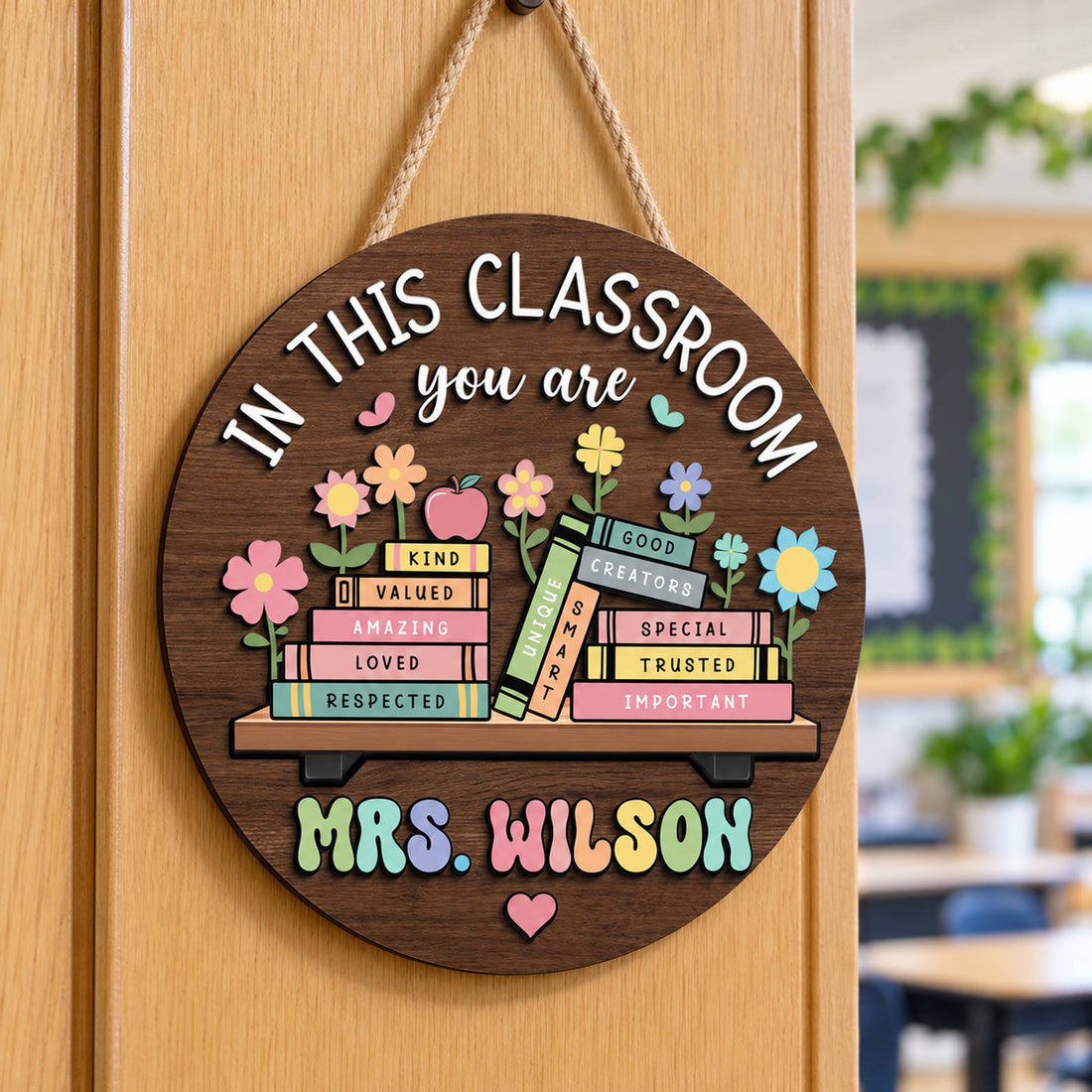 Personalized round wood teacher sign Mrs Wilson hanging on a classroom door