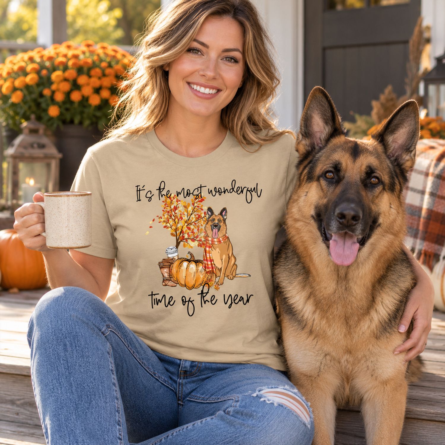 Dog mom wearing personalized fall German Shepherd t-shirt on a sunny autumn porch
