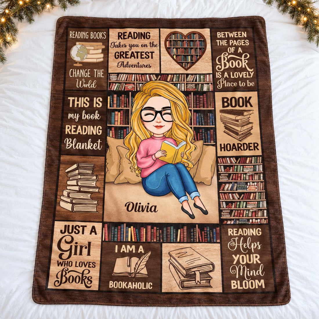 Just A Girl Who Loves Books personalized fleece blanket spread flat on bed with holiday greenery