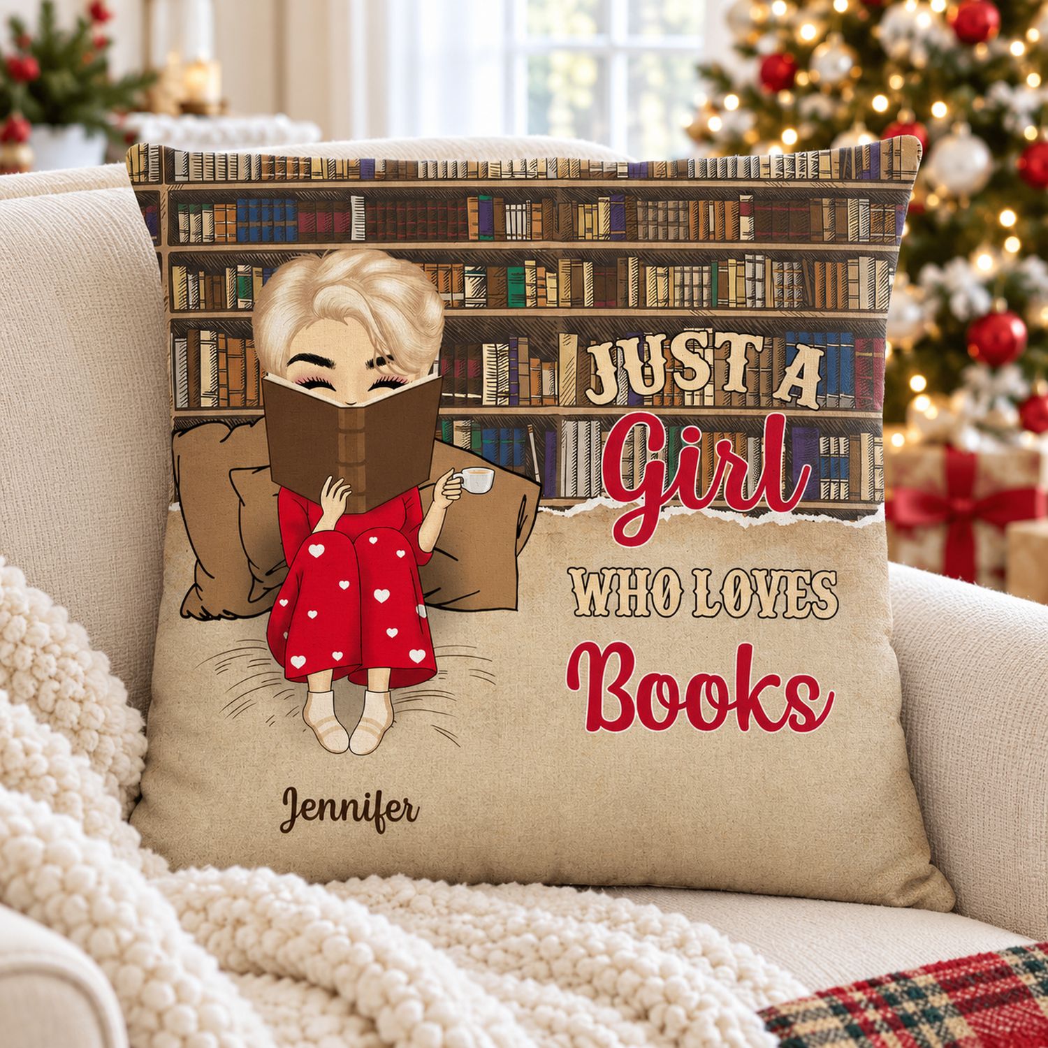 Personalized book lover pillow on an armchair near a Christmas tree