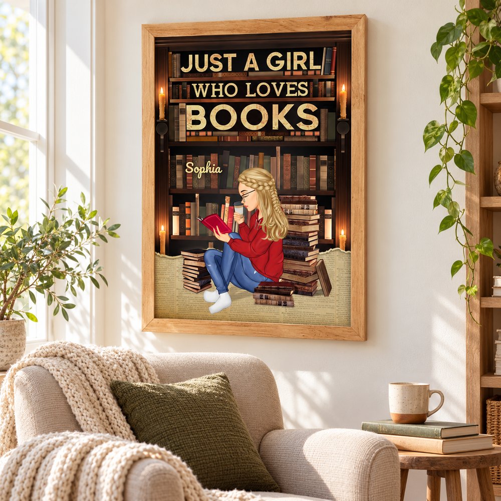 Personalized book lover framed poster hanging on the wall above a cozy reading nook armchair