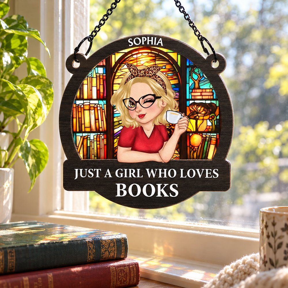 Personalized book lover window hanging suncatcher ornament hanging in a sunny reading nook window
