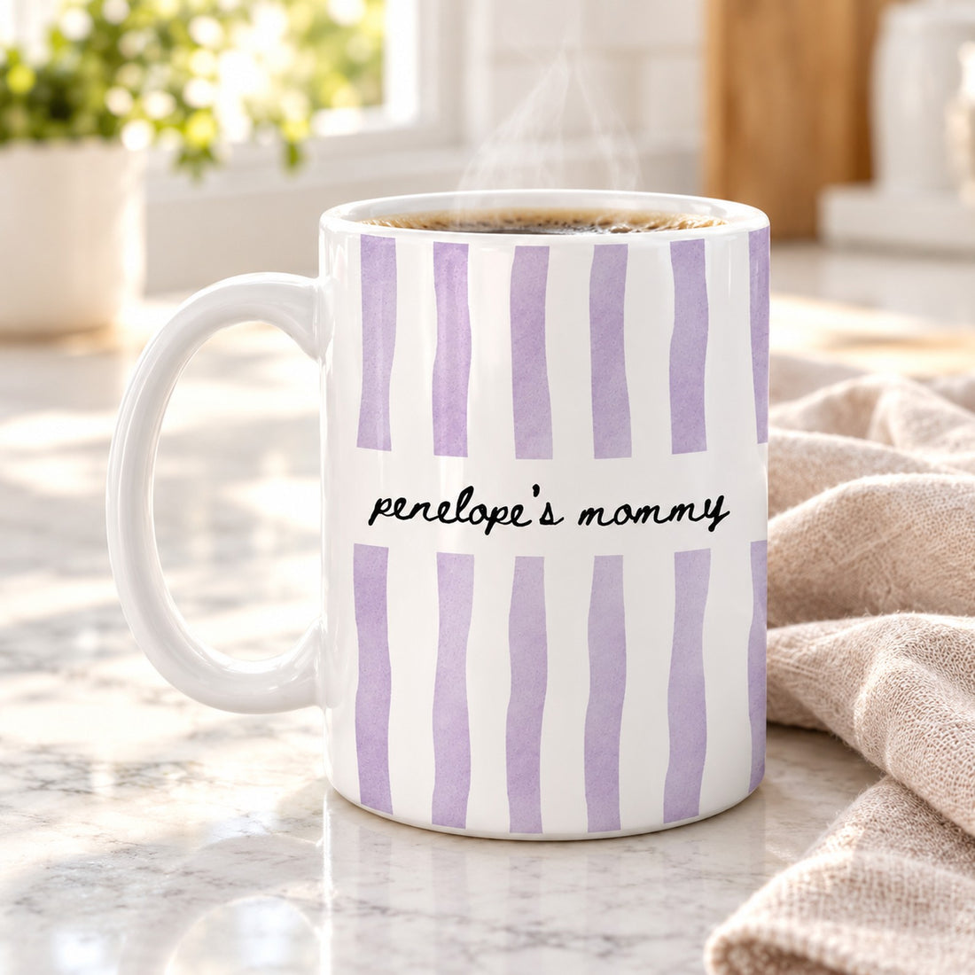 Steaming custom mom mug with lavender watercolor stripes and Penelope's Mommy text on counter