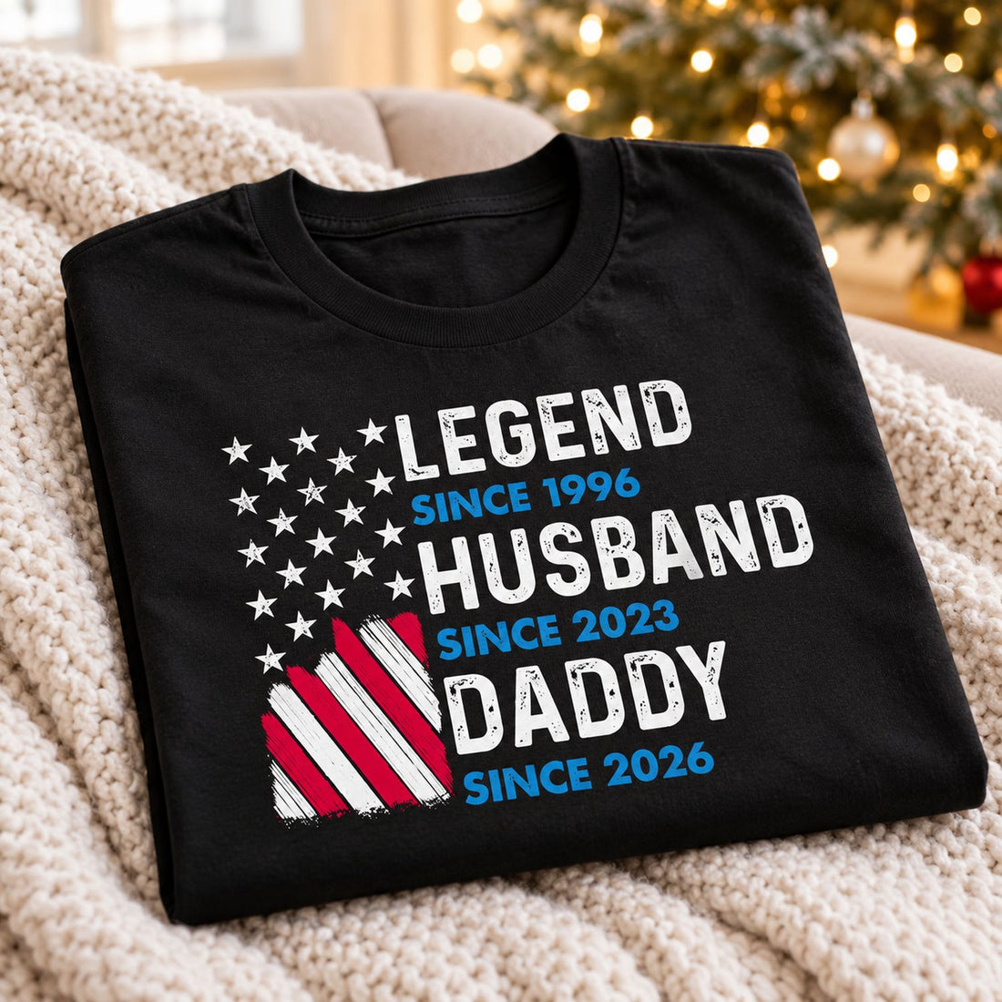 Folded Legend Husband Daddy custom t-shirt on sofa with holiday tree background