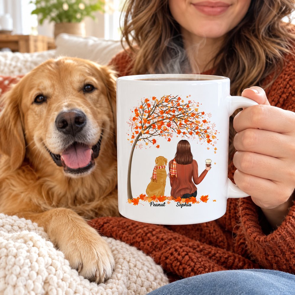 Dog mom holding steaming personalized Life Is Better With A Dog autumn mug next to golden retriever