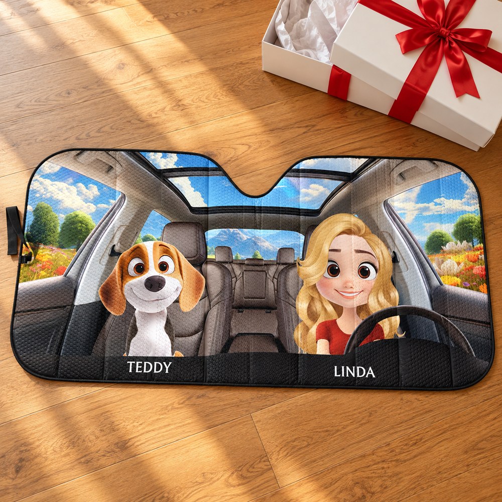 Custom dog lover car window sunshade next to a festive holiday gift box and ribbon