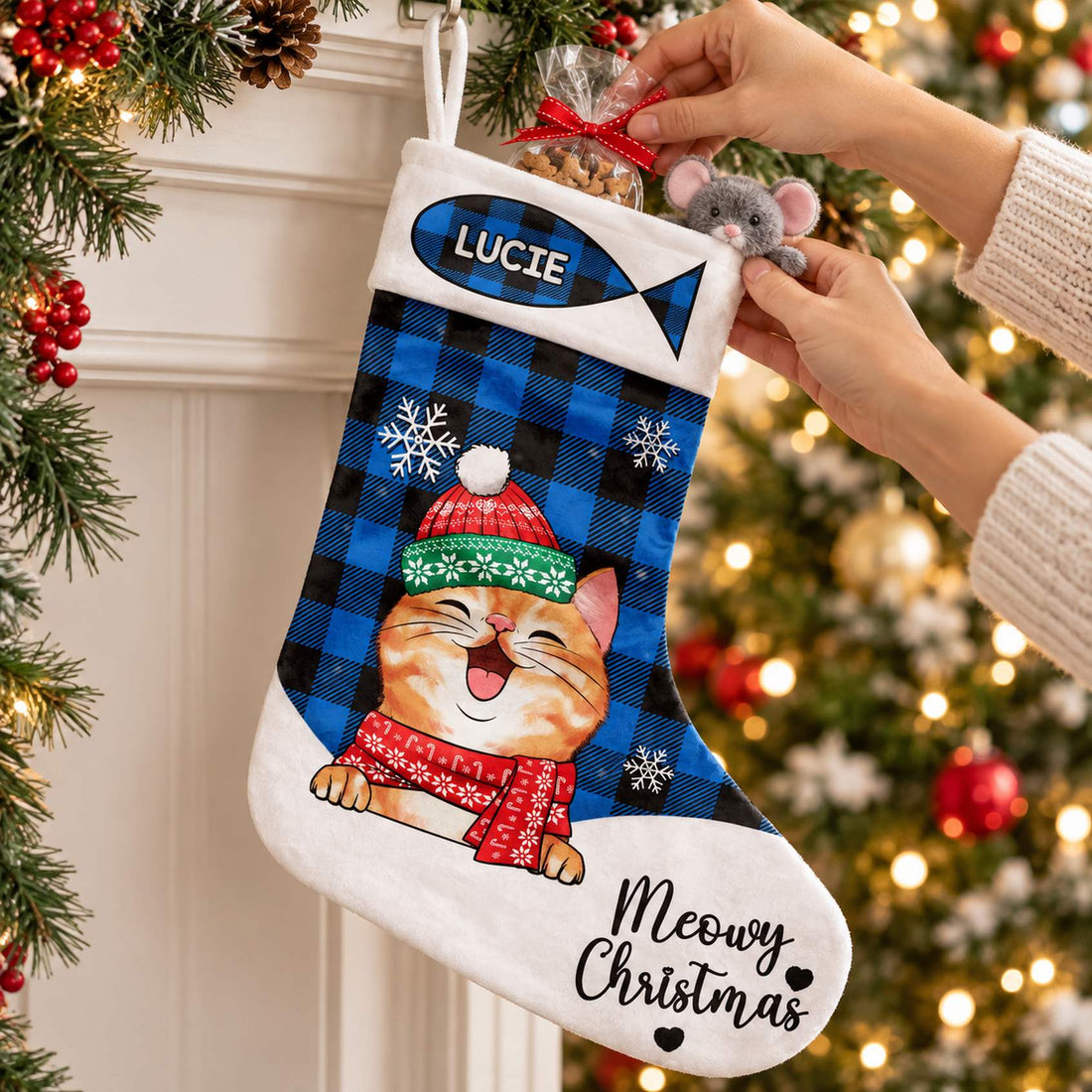 Filling personalized blue plaid cat Christmas stocking with pet treats and toys
