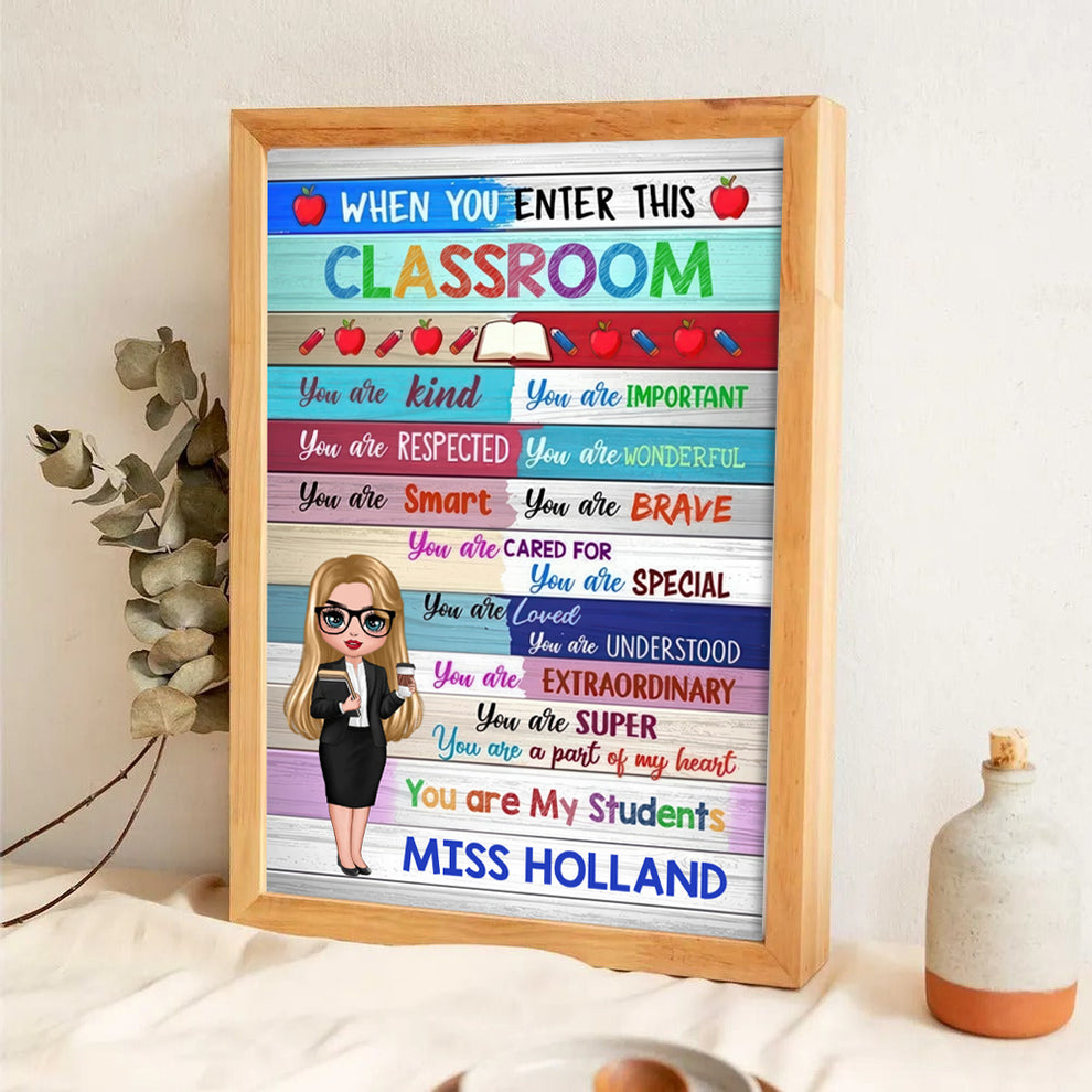 Personalized Colorful Doll Teacher Classroom Welcome poster, leaning against a wall on a wooden floor