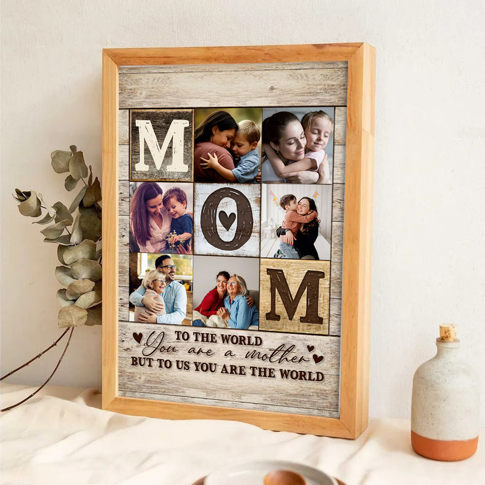 Custom Photo Collage Mom You Are The World poster, leaning against a wall on a wooden floor