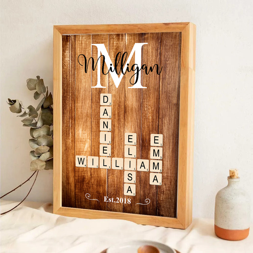 Personalized Family Name Crossword Puzzle Art canvas print, leaning against a wall on a wooden floor