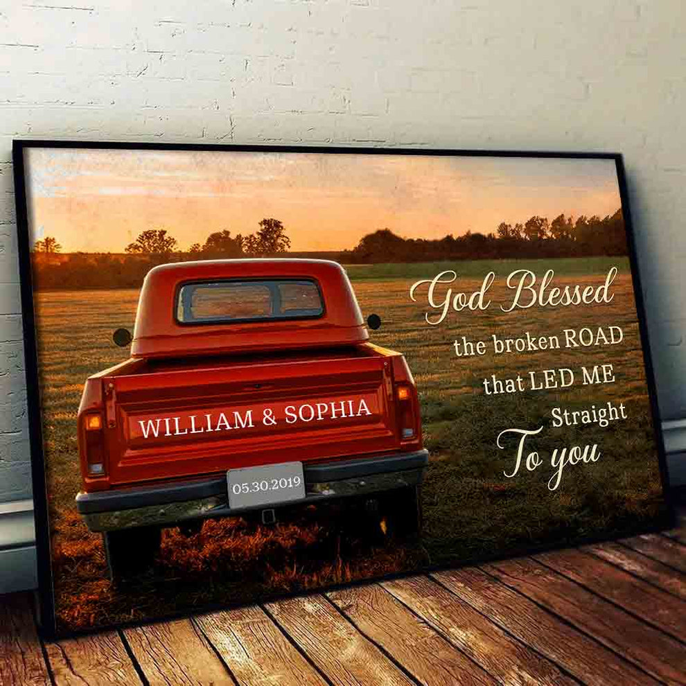 Personalized God Blessed The Broken Road Couple poster, leaning against a wall on a wooden floor