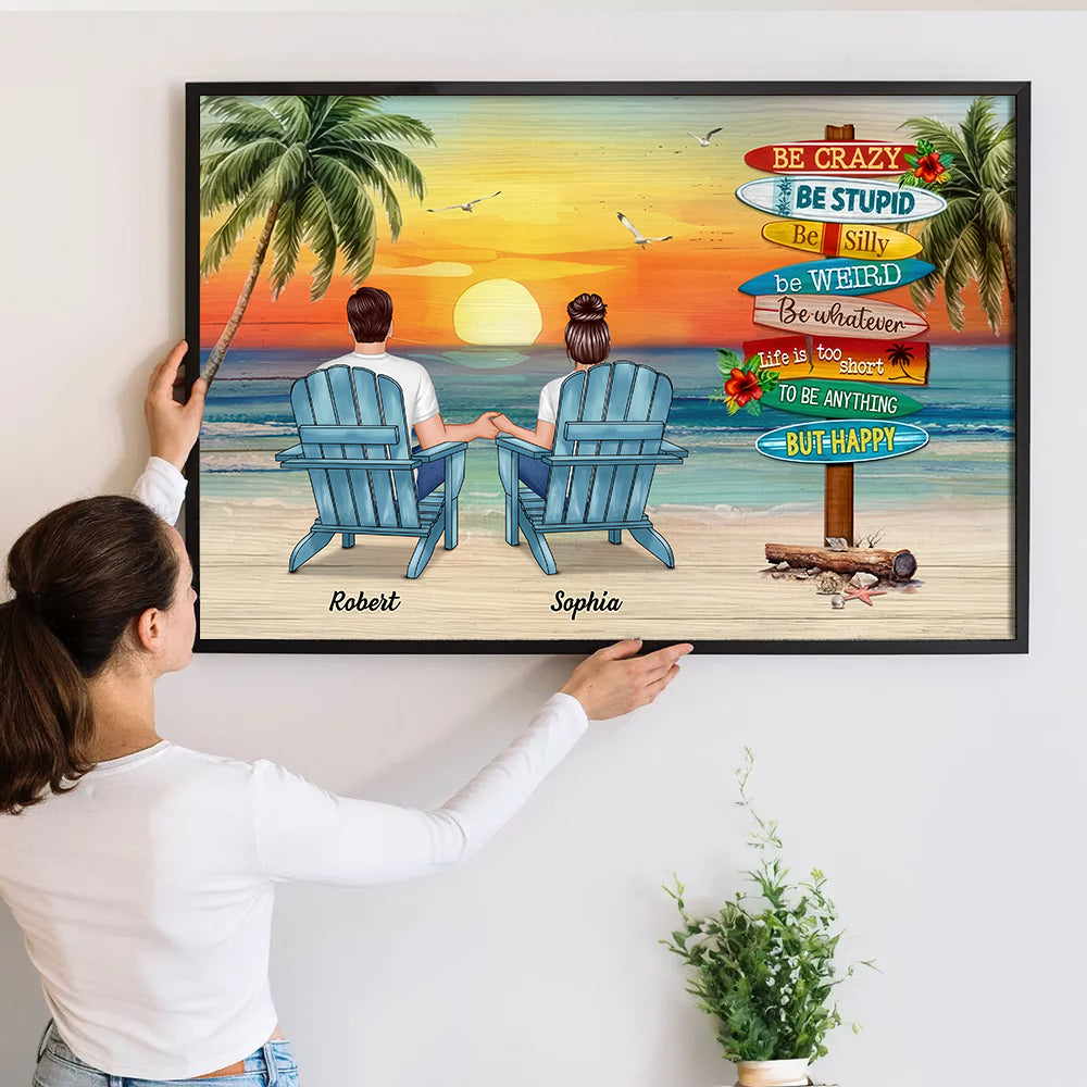 Personalized Summer Couple Sitting Be Happy poster, a woman hanging the framed print on a wall
