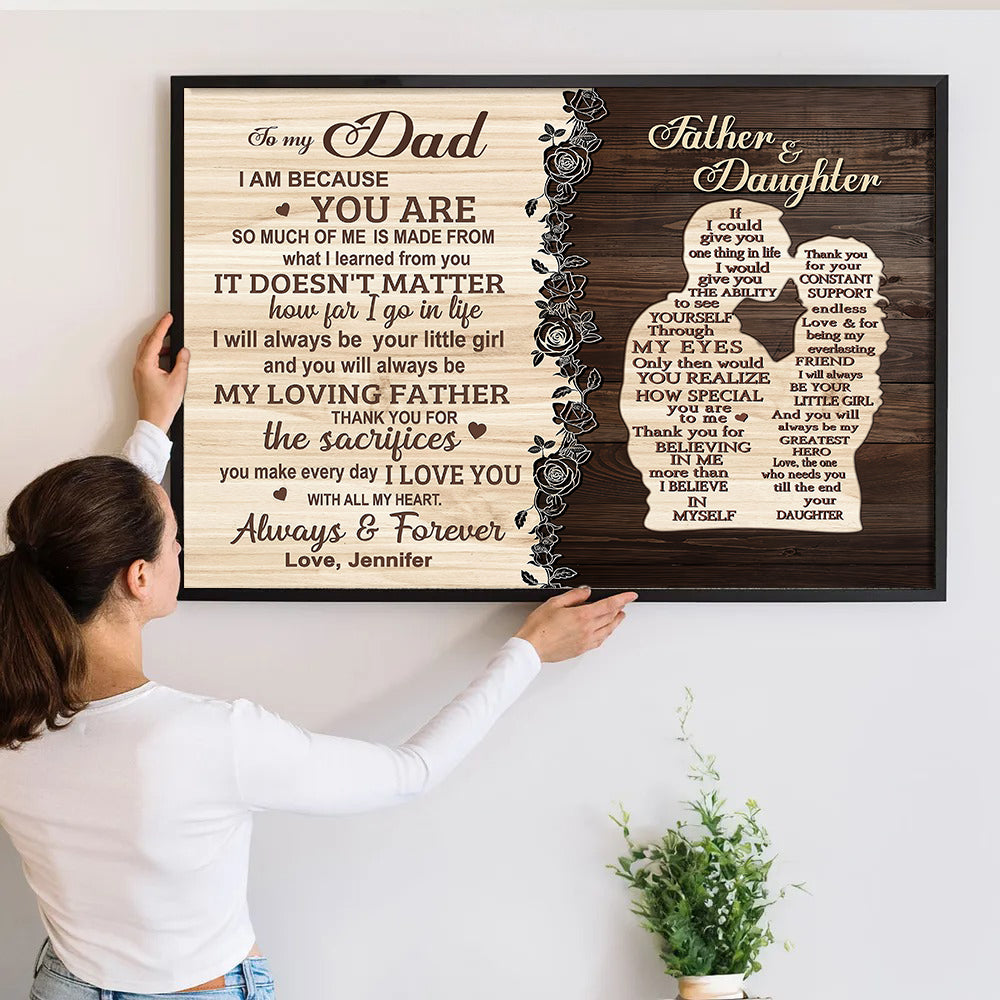 Personalized To My Dad From Daughter canvas print, a woman hanging the framed print on a wall