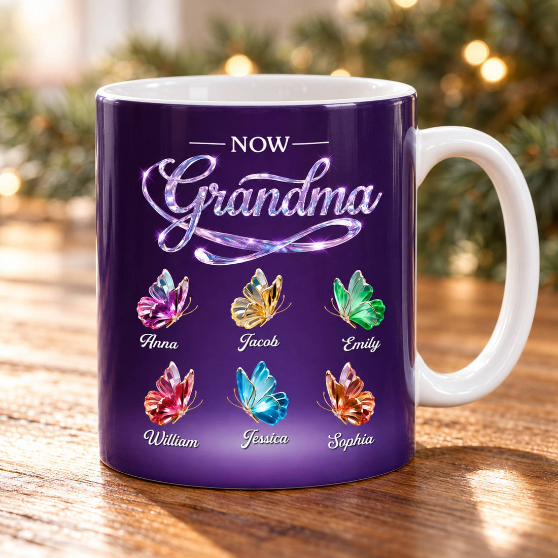 Personalized First Mom Now Grandma purple butterfly mug on wooden table with holiday greenery