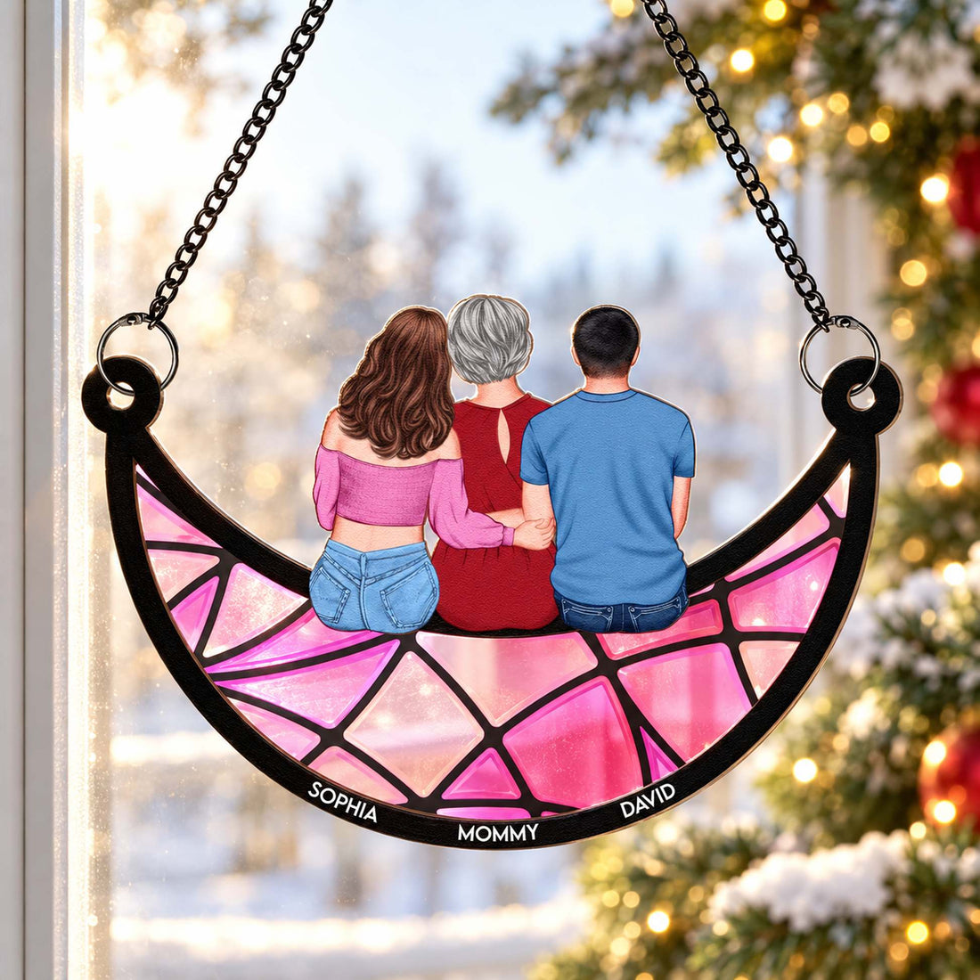 Mom and children moon window suncatcher in a festive holiday home setting