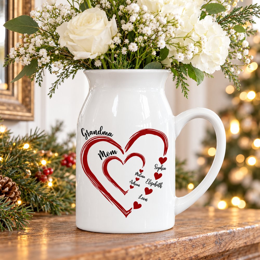 Personalized Mom Grandma ceramic flower vase with white blooms on a holiday mantel