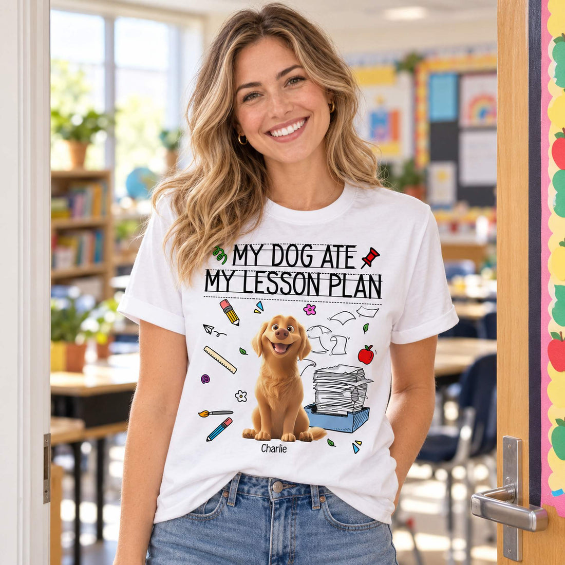 Female teacher wearing My Dog Ate My Lesson Plan personalized dog shirt in a bright classroom